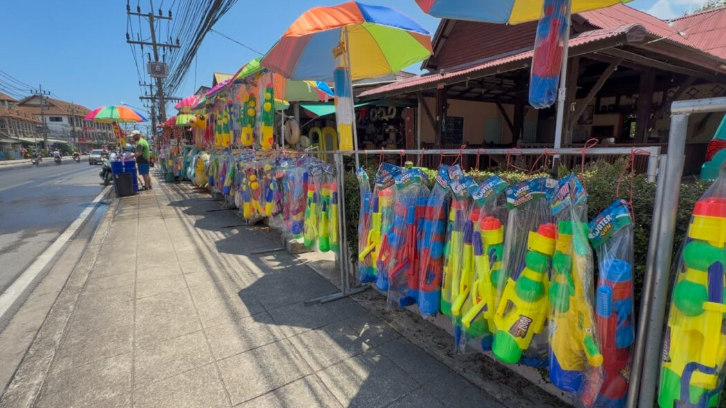 Colorful water guns for sale on the street in Koh Samui during Songkran festival 2026