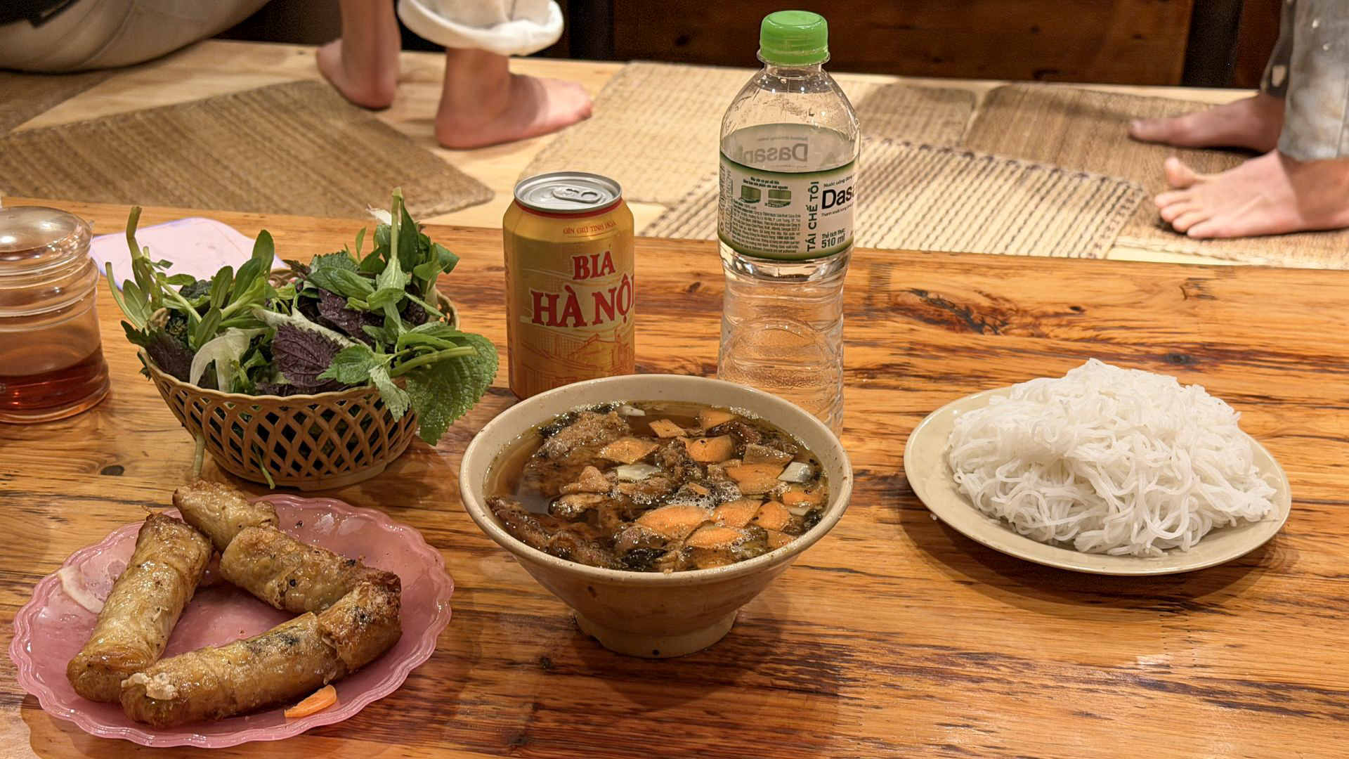 Traditional Bun Cha meal with grilled pork, rice noodles and fresh herbs in Hanoi, Vietnam. Traditional Bun Cha meal with grilled pork, rice noodles and fresh herbs in Hanoi, Vietnam.