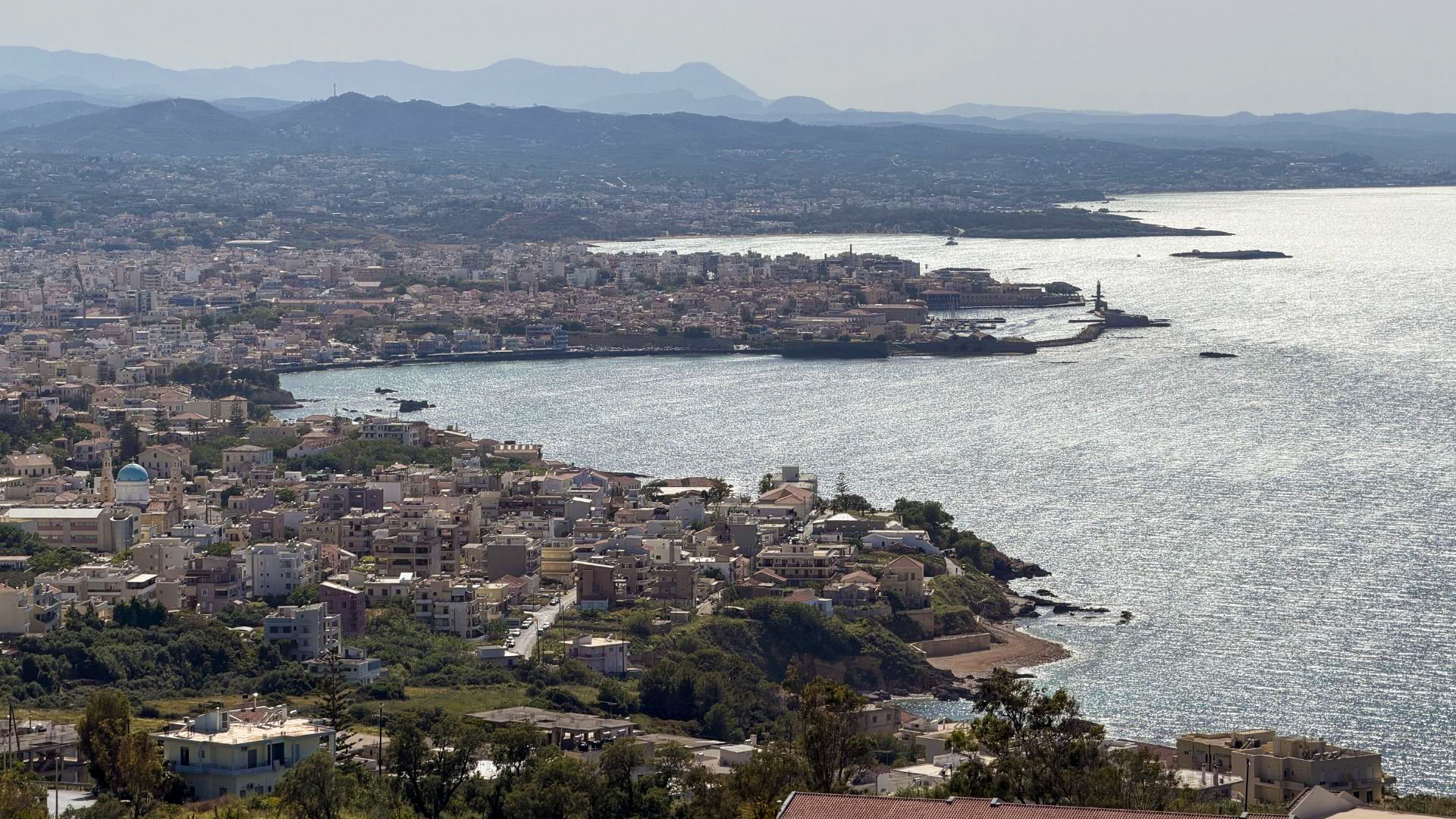 Panoramic aerial view of Chania city and harbour from the hills above, Crete Panoramic aerial view of Chania city and harbour from the hills above, Crete