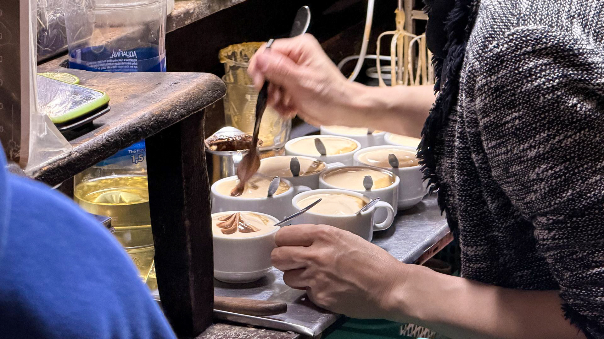 Traditional Vietnamese egg coffee being prepared in Hanoi, Vietnam. Traditional Vietnamese egg coffee being prepared in Hanoi, Vietnam.