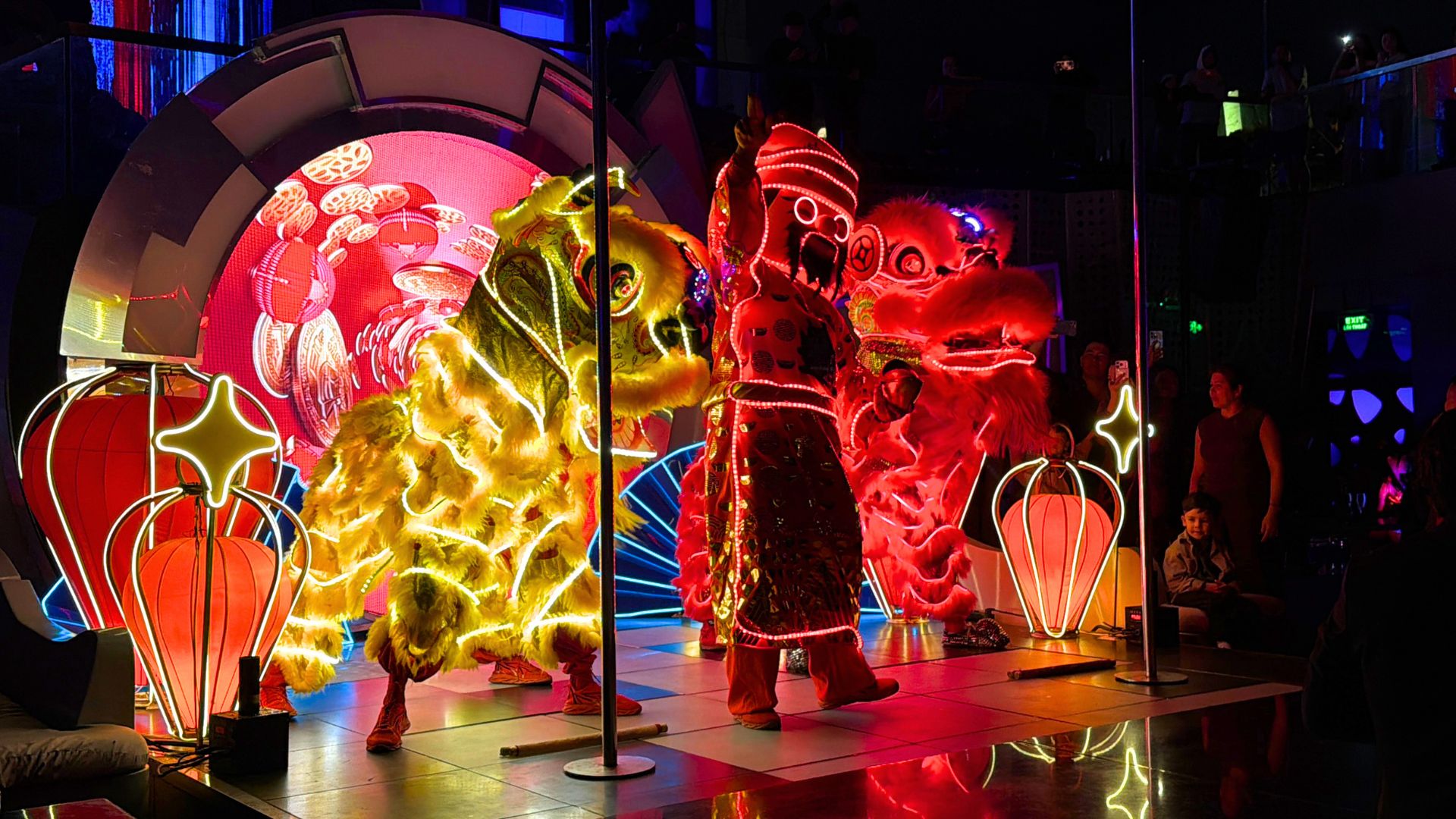 Traditional lion dance performance celebrating Tet Lunar New Year at Sky36 rooftop bar in Da Nang, Vietnam. Traditional lion dance performance celebrating Tet Lunar New Year at Sky36 rooftop bar in Da Nang, Vietnam.