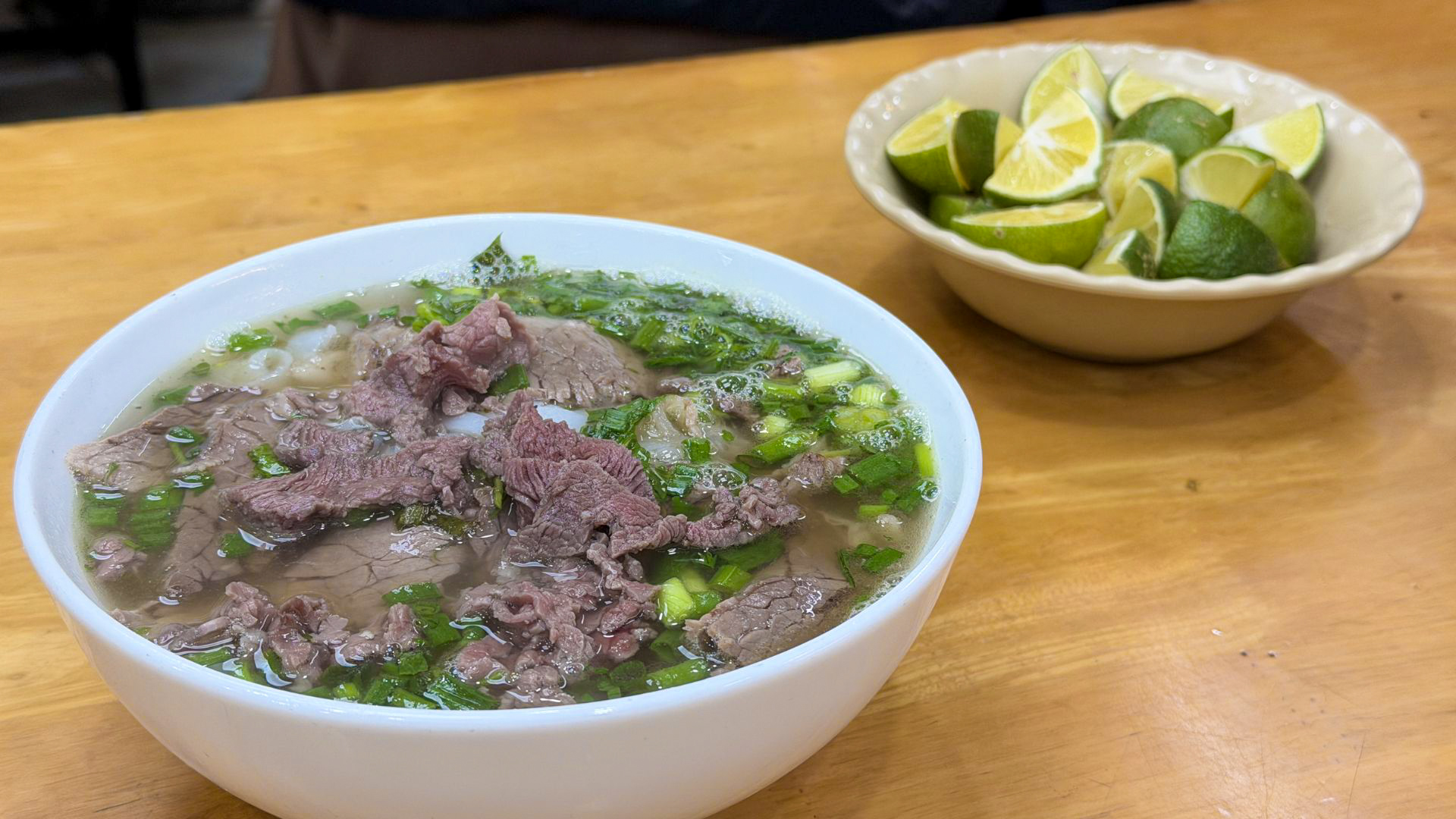 Traditional Pho Bo beef noodle soup served in Hanoi, Vietnam. Traditional Pho Bo beef noodle soup served in Hanoi, Vietnam.